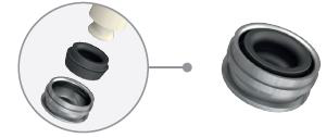 Close-up circle showing a black silicone insert being placed into a metal housing, linked by a line to a larger view of the housing with the silicone inside.